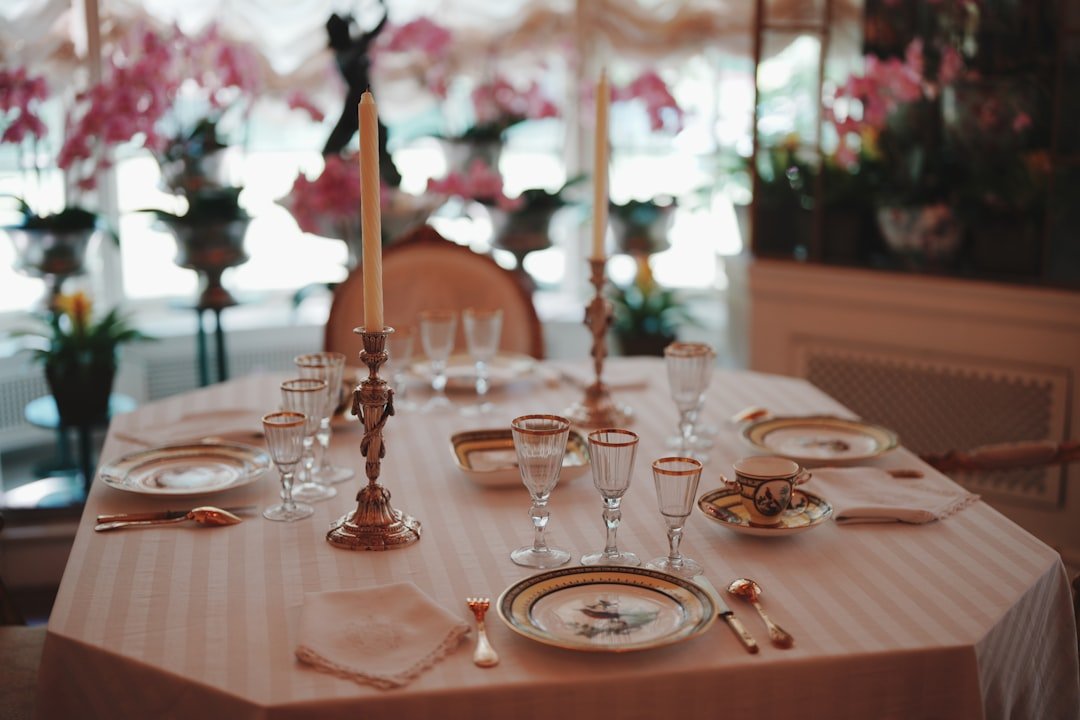 a-formal-dining-table-set-with-china-and-silverware-vikyygyrfra